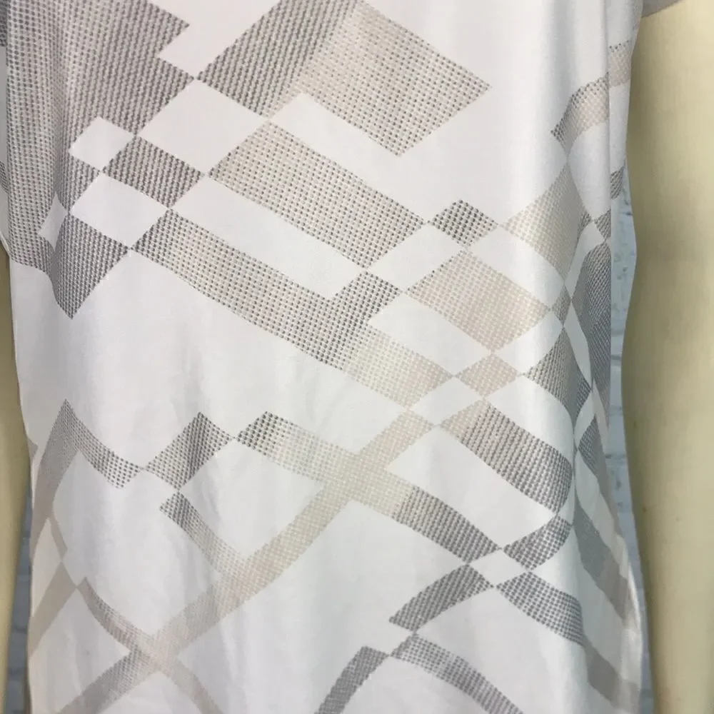 Nike Golf Size Medium Cream w/gray geometric ombré designs EUC